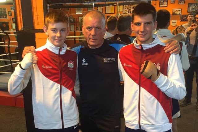 Eithan James (left) and Ben Vaughan (right) with Kings Heath ABC head coach Arthur Daly