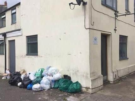 A photo of the rubbish pile taken on July 3. The mess has been growing "for weeks" according to one resident.