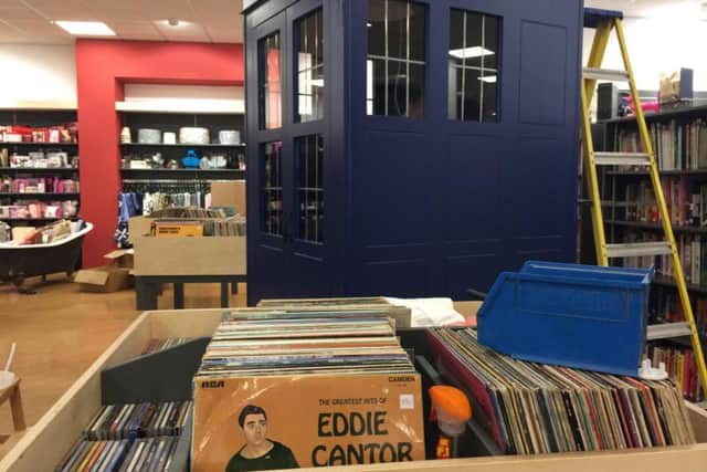 The vinyl record collection has a Tardis fitted with a turntable and headphones.