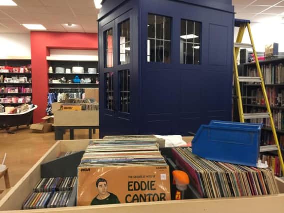 The vinyl record collection has a Tardis fitted with a turntable and headphones.