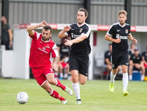 John-Joe O'Toole, pictured in action at Frome last week, missed Town's friendlies against Kettering and Derby, sparking wild speculation online regarding his future at the club
