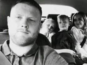 Daniel Butcher with his three children.