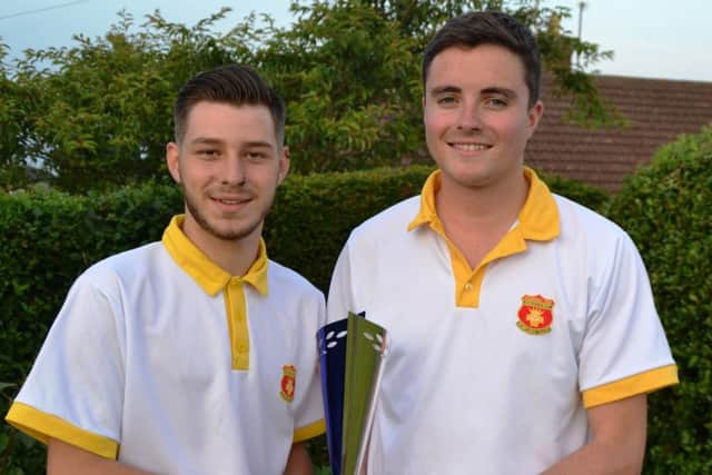 COUNTY CHAMPIONS - Kingsthorpes Conor Bryan and David Iddles after their Under-25s Pairs county final win over Danny Walker and David Walker of Northampton West End