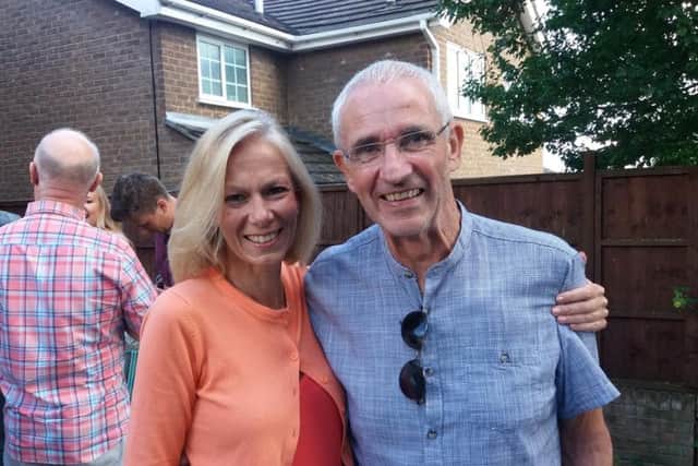 Tom pictured with Dr Louise Maynard who was running near him in the race and led the team that included Selly, who saved him on the day of the run.