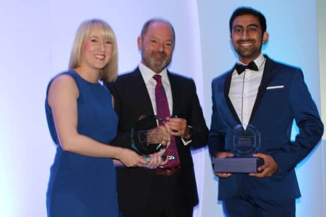 Monil Patel (right) gets his prize