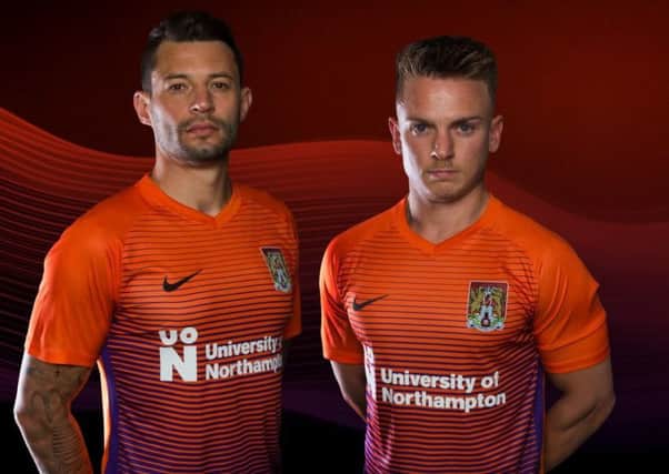 NICE AND BRIGHT - Marc Richards and Sam Hoskins show off the new Cobblers third kit