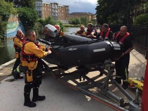 A rescue boat was launched in response to the spill.