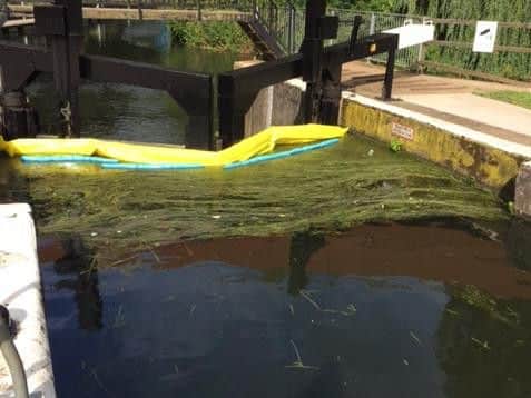 The Fire Service used a boon to stop the flow of the water while they traced the source of the spill.
