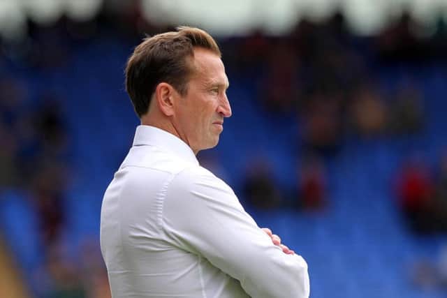 FRUSTRATED: Justin Edinburgh felt his side should have had a clear penalty in the last minute. Picture by Sharon Lucey
