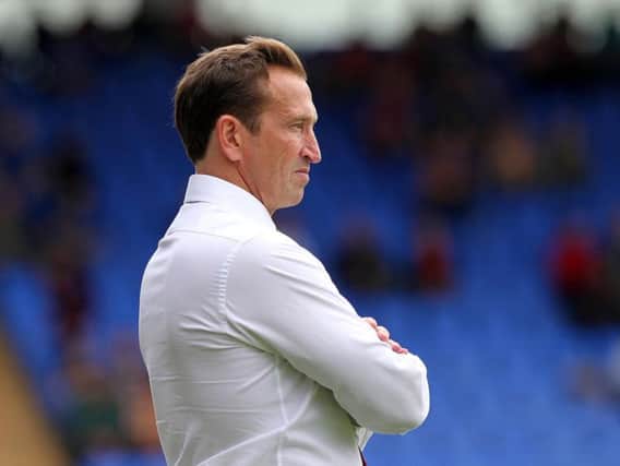 FRUSTRATED: Justin Edinburgh felt his side should have had a clear penalty in the last minute. Picture by Sharon Lucey