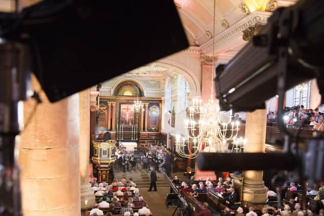 BBC crews set up eight cameras in the church.