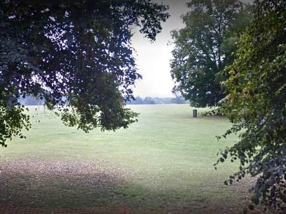 A man was attacked by dogs in Delapre Park.
