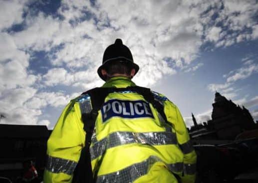 A girl aged 13 was attacked by a man as she walked across a footbridge on Monday.