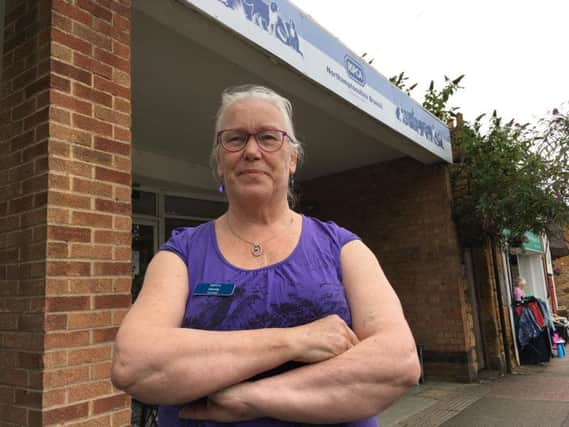 Volunteer Wendy Lavaast outside the RSPCA store in Main Road, Duston, which has been hit by another break-in.