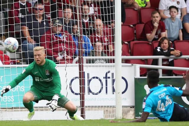 David Cornell is rendered motionless as Devante Cole's shot heads towards the corner. Pictures: Sharon Lucey
