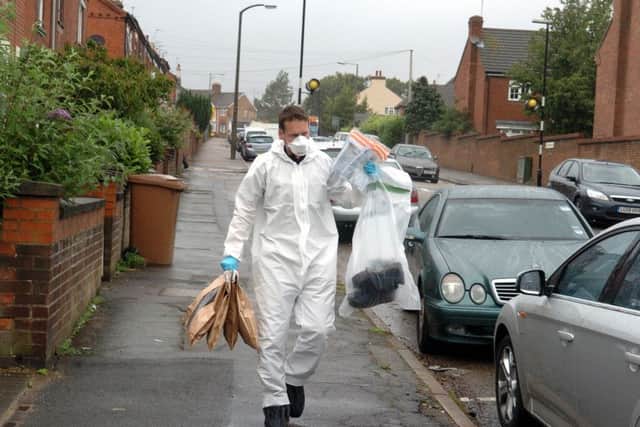 Wellingborough, 56, Senwick Road Karoly Varga murder hunt. Police have arrested four people with conspiracy to commit murder. Scenes of Crime officers remove evidence from the house Thursday, 04 August 2011 ENGNNL00120110408173958