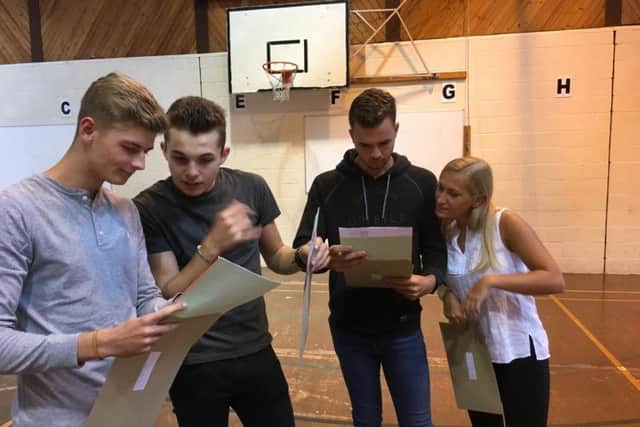 Elizabeth Woodville pupils open their results.