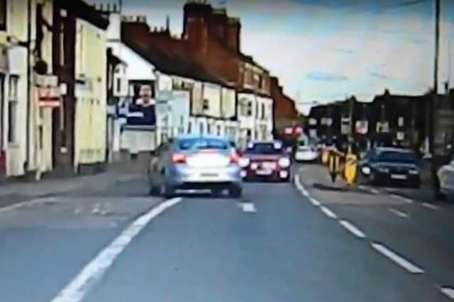 The car can be seen approaching at speed at Dashcam footage shown to the Chron.