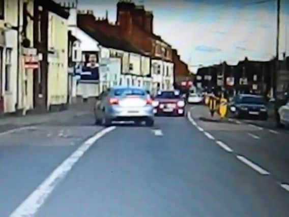 The car can be seen approaching at speed at Dashcam footage shown to the Chron.