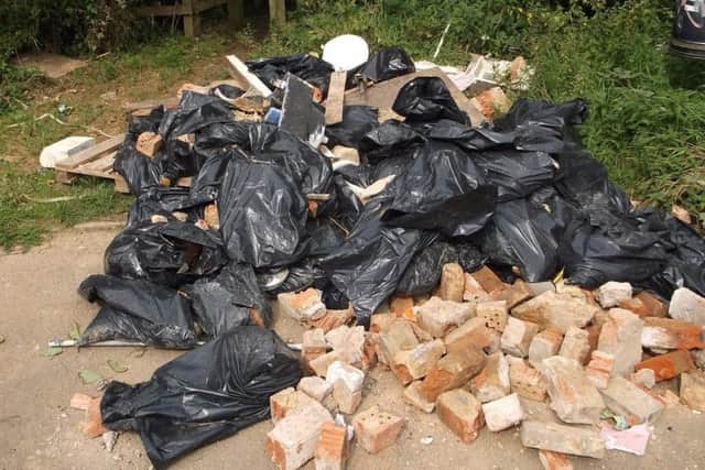 Builders waste dumped near Old Stratford Community Centre.