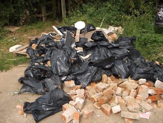 Builders waste dumped near Old Stratford Community Centre.