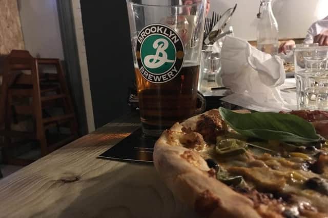 The spicy chipotle pizza and Brooklyn Lager are a winning combination.