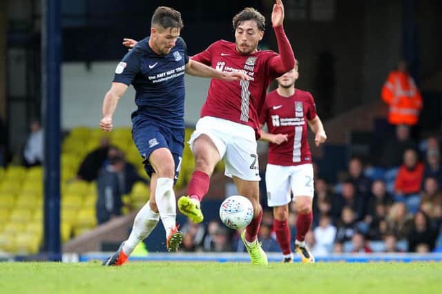 Matt Crooks challenges for the ball at Southend