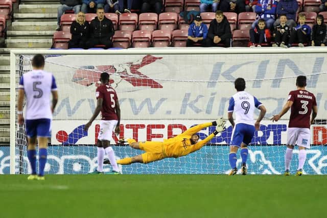 A flying Matt Ingram can't reach Michael Jacobs' fine strike