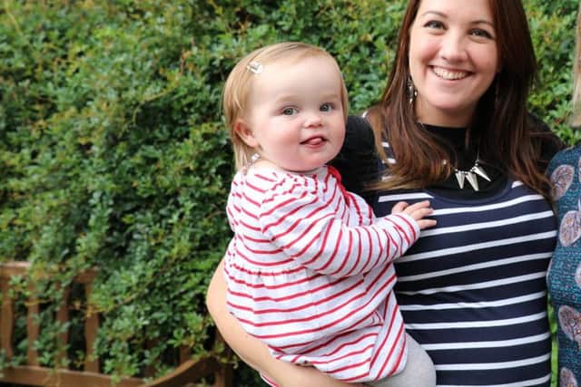 Steph Loakes with 17-month-old-daughter, Mollie.