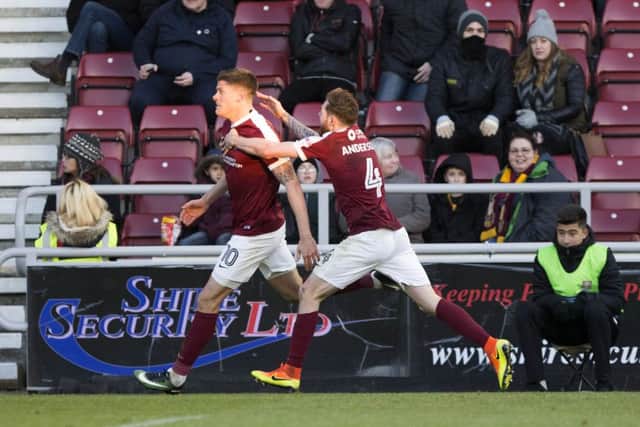 Alex Revell celebrates after firing the Cobblers ahead against Bradford last season, only for the Bantams to fight back and win 2-1 to do the double over Town