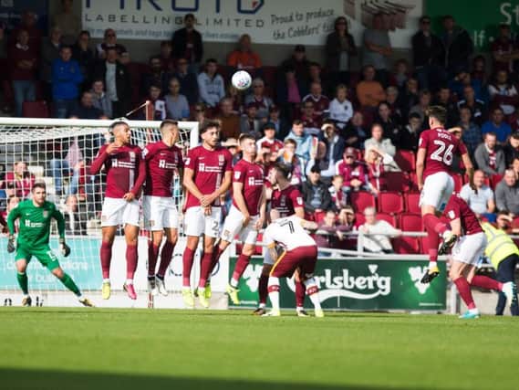 Tony McMahon curls home his free-kick for Bradford City (Pictures: Kirsty Edmonds)