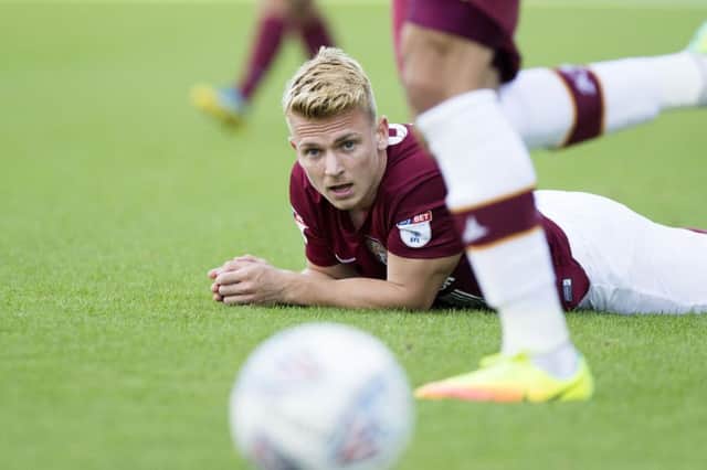Eyes on the ball: Sam Hoskins was back in Cobblers claret on Saturday. Pictures by Kirsty Edmonds