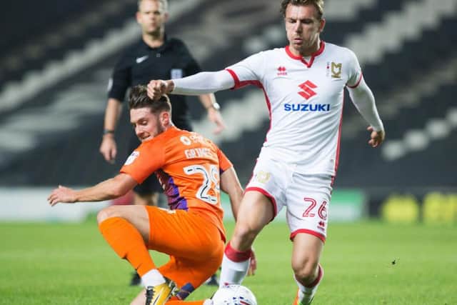 Matt Grimes loses possession on this occasion
