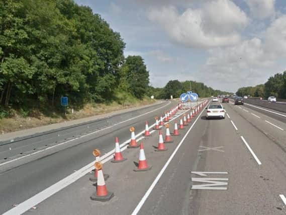 13 people were seen leaping from a lorry and running to the hard shoulder near Northampton services.