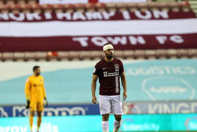 Despite the fact attendance was low at the Wigan Athletic away game, Northampton Town fans were told they could not pick up near the stadium as the forecourt was full.