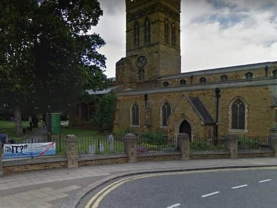Police want to speak to an Asian man aged "about 50" in connection with a flashing incident in the grounds of St Giles Church.