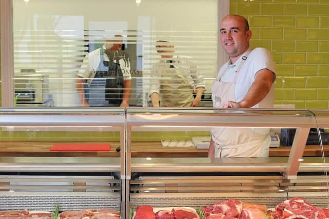 Tom Hewer at one of his butcher stores.