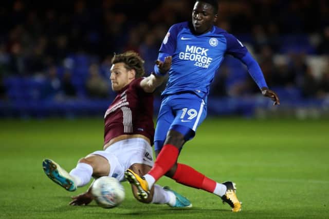 Ash Taylor puts in a solid challenge in the recent 1-1 draw at Peterborough United