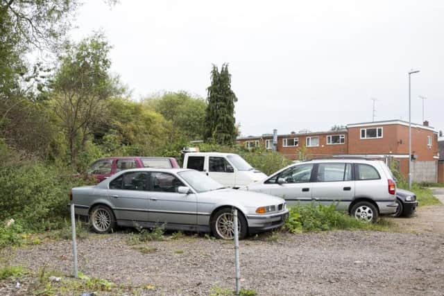 Roy claims these cars have been left abandoned on grounds originally meant for a child's play park.