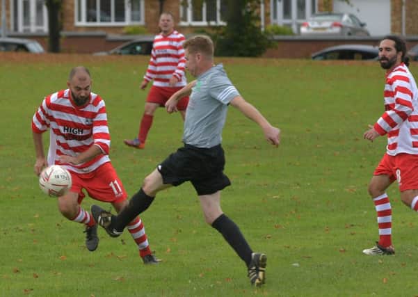 ACTION from the Sunday Combination Veterans League match between Spencer and Thorplands Club 81 (Pictures: Dave Ikin)