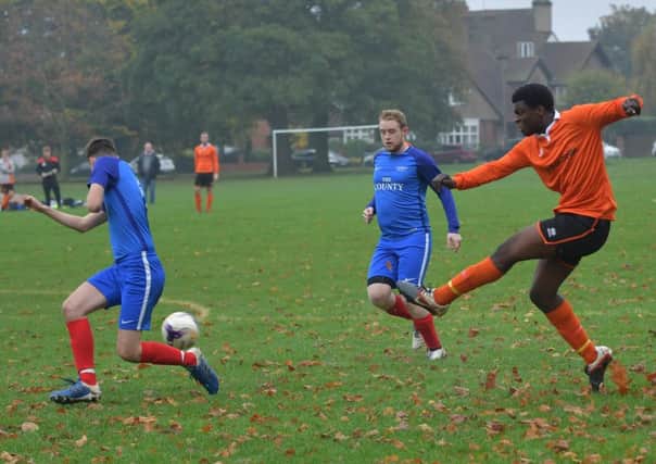 GETTING HIS SHOT OFF - action from Barratts' 2-2 draw with AFC Becket  in the Sunday Combination Division One (Pictures: Dave Ikin)