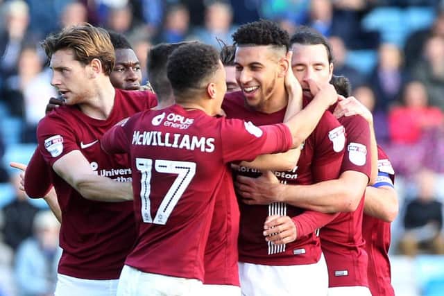 OFF THE MARK: Daniel Powell's long-range strike was his first Cobblers goal. Pictures: Sharon Lucey