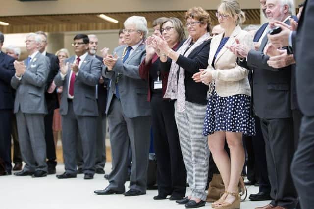 Councillors and staff applaud Sajid Javid, the local government minister, as he officially opened One Angel Square earlier this month