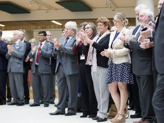 Councillors and staff applaud Sajid Javid, the local government minister, as he officially opened One Angel Square earlier this month