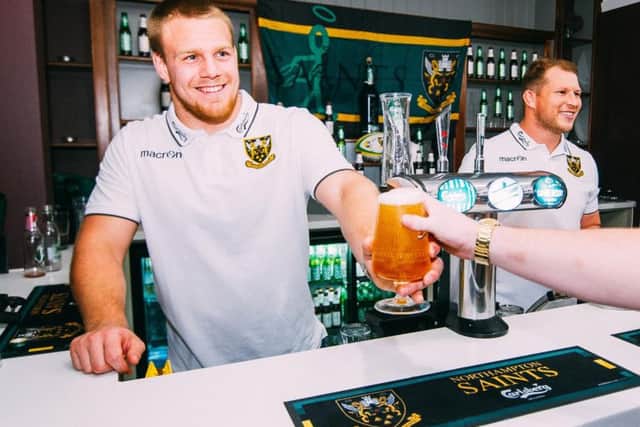 Paul Hill and Dylan Hartley pull a pint