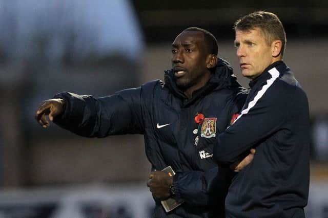 Jimmy Floyd Hasselbaink in discussion with assistant Dean Austin