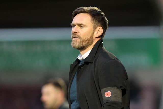 FAMILIAR FACE: Northampton face Graham Alexander's side for the second of three meetings in 14 days on Tuesday