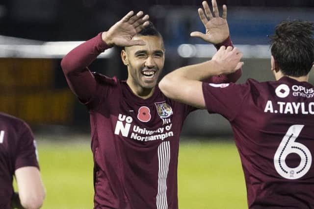 ALL SMILES - Lewis McGugan opened his goal account for the Cobblers in midweek (Pictures: Kirsty Edmonds)