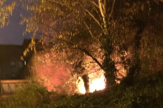 A witness snapped this picture of the tent fire.