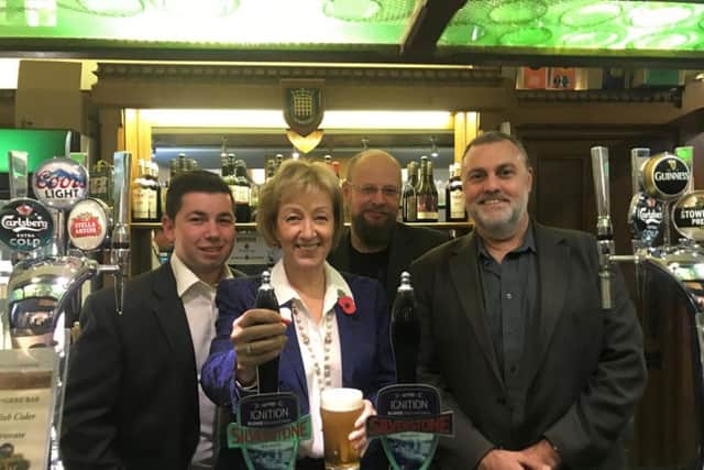 Andrea Leadsom pulls a pint of Ignition with Silverstone Real Ale Brewery